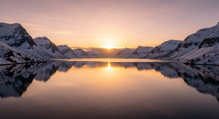 arctic midnight sun fjord hero
