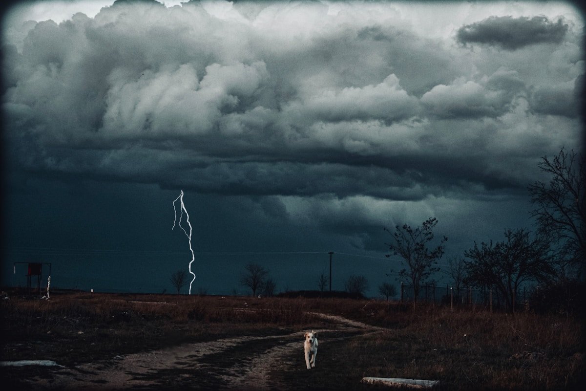Tornado in the distance over open field