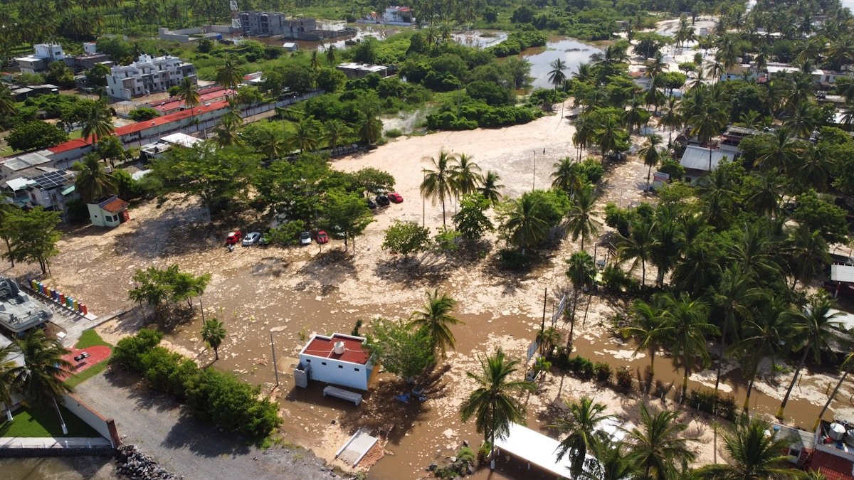 Flooded town with debris and submerged buildings after disaster