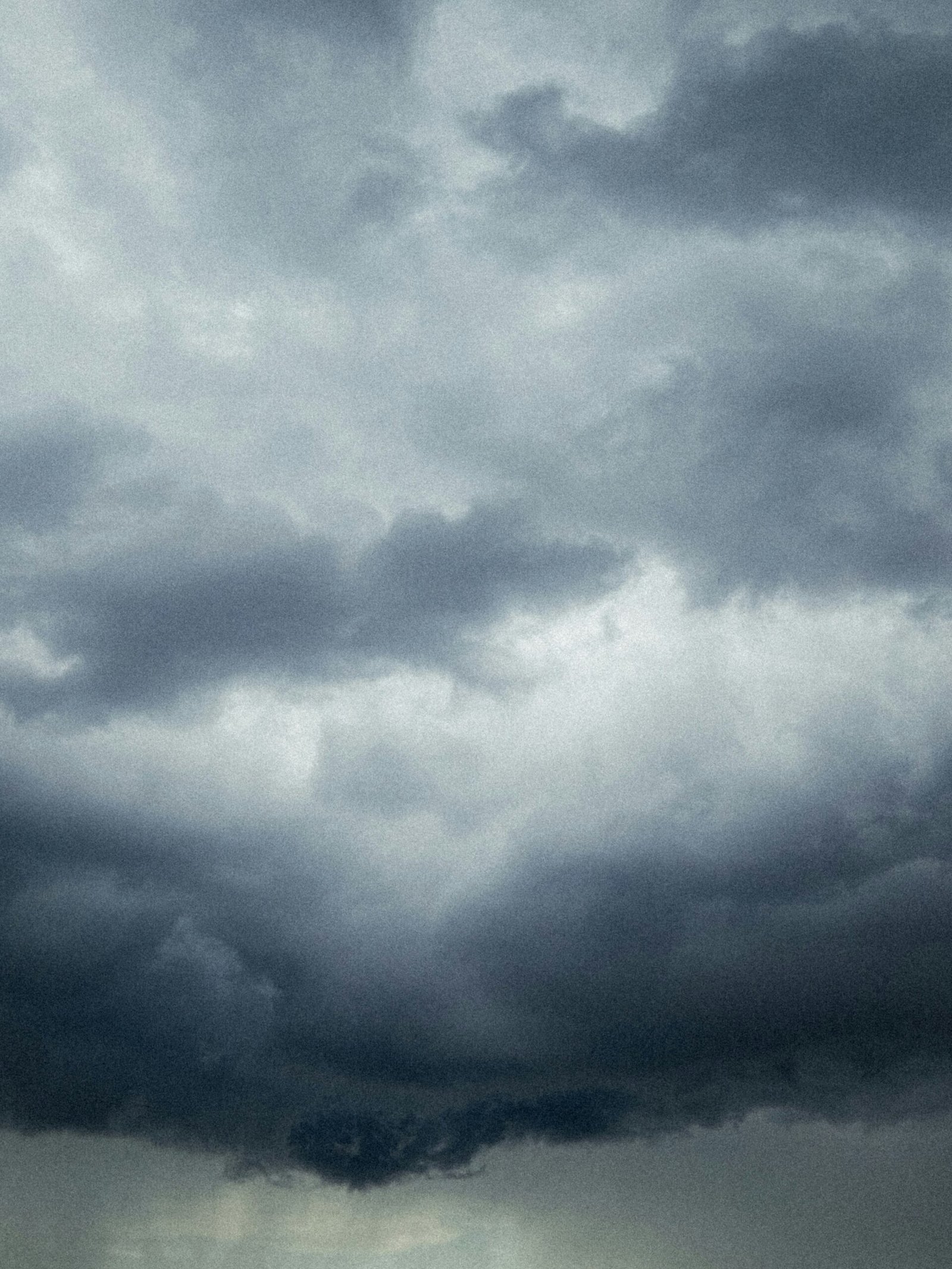 Dark ominous storm clouds covering the sky during monsoon season