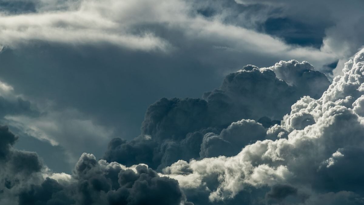 Dramatic storm clouds over the landscape illustrating daily weather patterns