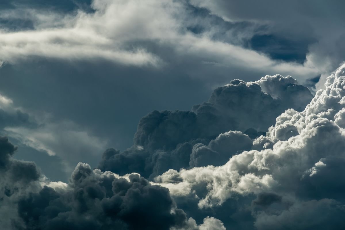Dramatic storm clouds over the landscape illustrating daily weather patterns